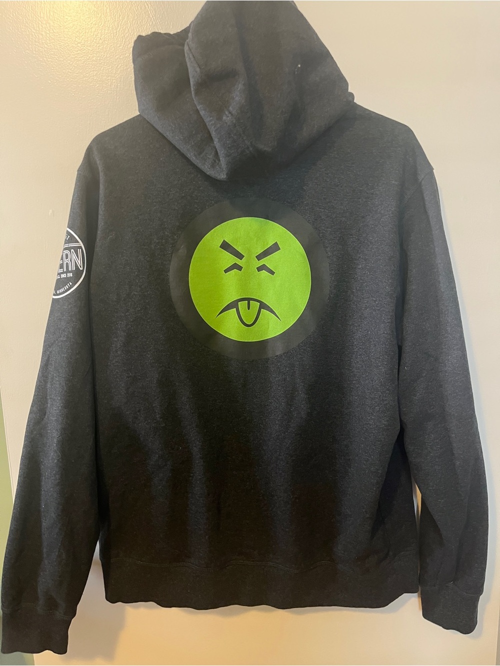 District Black Zip-Up Hoodie with Neon Green Emoticon Back Graphic